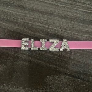 Charm bracelet personalized to say Eliza with rhinestone letters